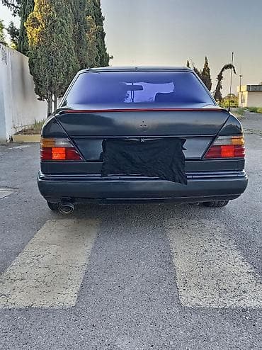 opel astra k: Mercedes-Benz W124: 2 l | 1990 il Sedan — 2