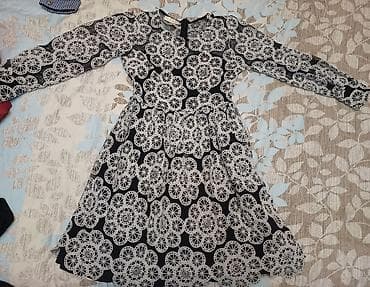 Qadın geyimləri dəsti 1) Qara-ağ naxışlı don - Uzunqol, dairəvi və — 1