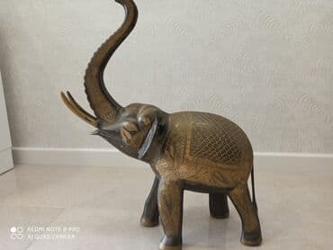 1 dollar qiyməti: Qedimi Fil latundan, çekisi agirdir. Ölcusu 50x 61sm, çekisi 4.5 — 1