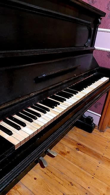 piano az: Upright pianino – klassik dizaynlı, qara rəngdə korpus. - 88 klavişli — 3