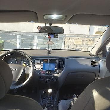 mini cooper 2009: Kia Rio: 1.4 l | 2008 il Sedan — 2
