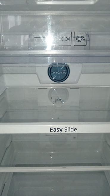 irşad soyuducu samsung: Məhsul: İki qapılı soyuducu (üst kamera dondurucu) Xüsusiyyətlər: - — 4