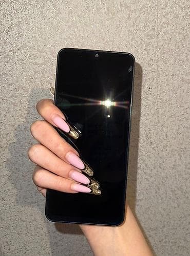 note 50 pro: Redmi A5, 64 GB, rəng - Qara, Simsiz şarj — 1