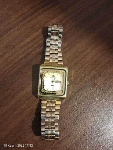 el fecr saat: Qol saatı, Orient, rəng - Qızılı — 2