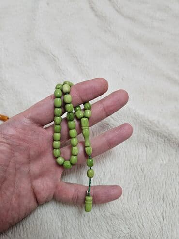 Portmone, pulqabıları: Məhsul: Təsbeh dəsti (3 ədəd) Təsvir: - Üç müxtəlif rəngdə təsbeh — 4