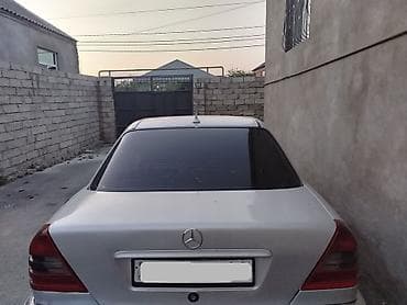 bmw x5 e53: Mercedes-Benz C-Class: 2.2 l | 1996 il Sedan — 6