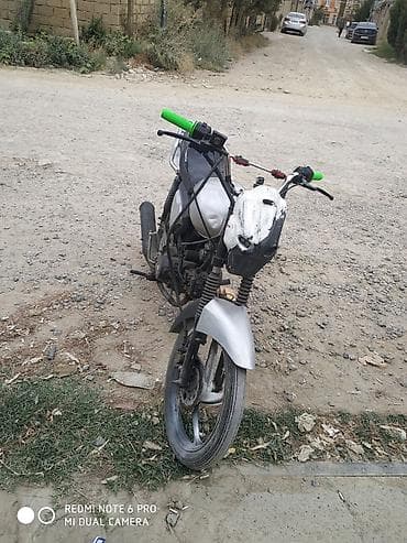moto usda: Tufan M50 tecili satilir 
arxa tirmuz yoxdu otur surdu 
barter var — 1