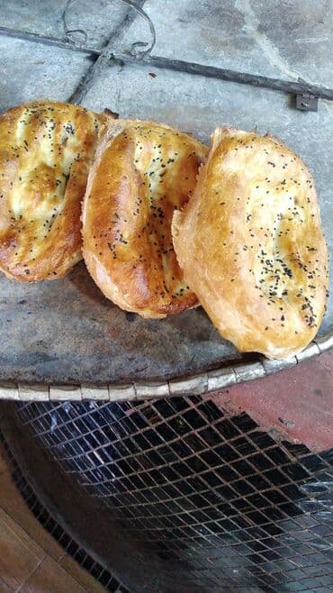 Bitkilər: Təndirdə işləmək üçün çörək qızardan tələb olunur. Gəncə təndiri — 2