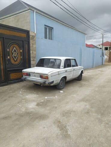 ваза стеклянная прозрачная высокая без узора: Avtomobil: VAZ 2106 (klassik “Jiquli” sedan) Rəng: ağ Kuzov: 4 qapılı — 2