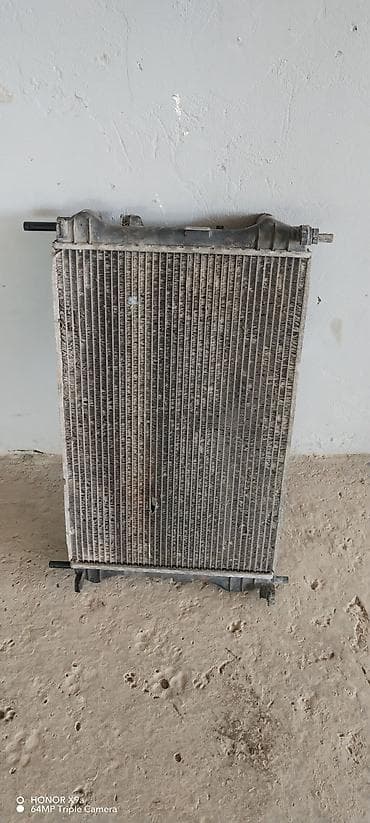 Радиаторы: Ford orijinal radiator (soyutma sistemi üçün) - Marka: Ford (üst — 3