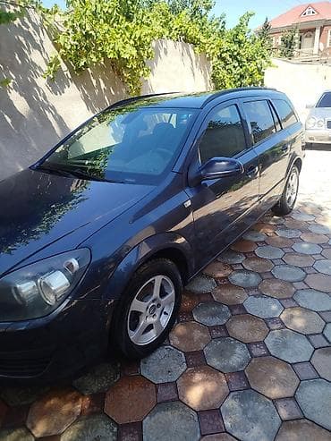 Opel Astra H Caravan (universal kuzov) - Kuzov: 5 qapılı universal