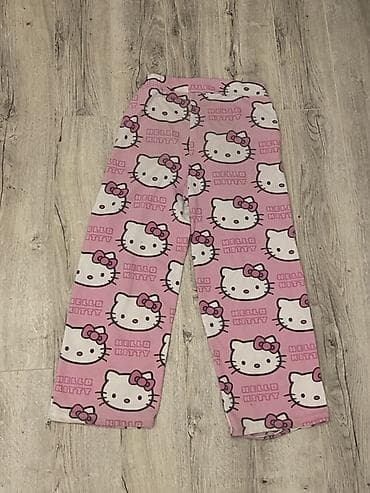 ev geyimler: Hello Kitty naxışlı yumşaq ev şalvarı. Şalvar çəhrayı rəngdədir və — 2