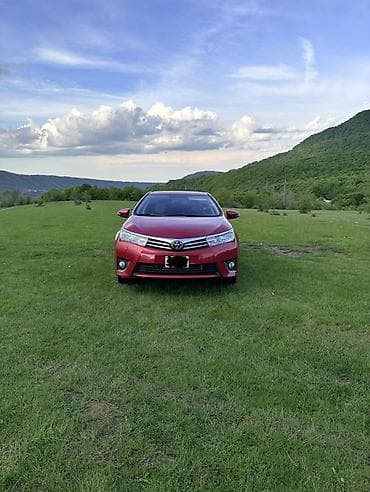 traktor satiwi: Toyota Corolla: 1.6 l | 2014 il Sedan — 2