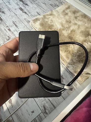 ipad mini 2: Hdd 1 tb madelin bilmirem sandisk kimi isdifade olunub yeni fileş — 2