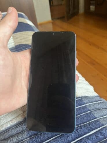 paltaryuyan ikinci el: Xiaomi Redmi 9A modeli, rəngli qutusu ilə birlikdə təqdim olunur. Bu — 3