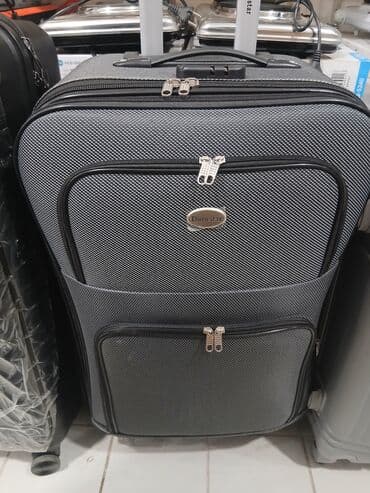 купить чемодан на колесах: Dörd təkərli səyahət çantası, möhkəm materialdan hazırlanmışdır və — 4