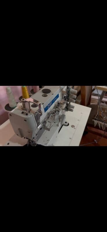 Interlock . Tikiş maşını