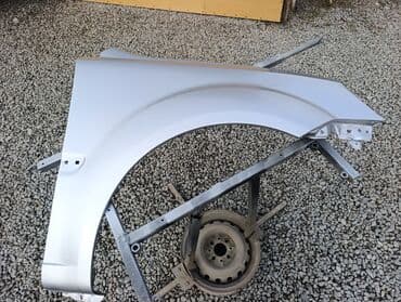 Soyutma və qızdırma sistemləri: Məhsul: Avtomobilin ön sağ qanadı (fender) Rəng: Gümüş/boz metalik — 2