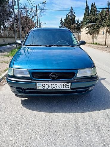 opel astra oluxanasi: Opel Astra F Caravan (universal), mavi rəng Xüsusiyyətlər:.1997 - — 4