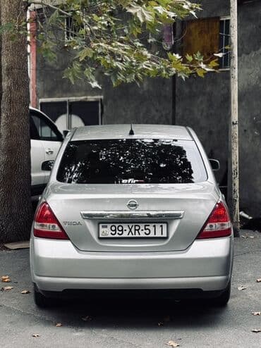 mersedes disk r15: Nissan Tiida: 1.6 l | 2006 il Sedan — 1