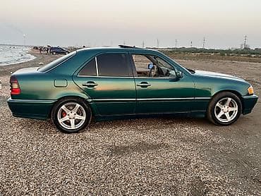 priora diskleri: Mercedes-Benz C-Sinfi sedan (W202) – tünd yaşıl rəng, bej dəri salon — 6