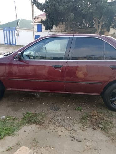 Bıçaqlar: Nissan Sunny sedan - Kuzov: 4 qapılı sedan, tünd qırmızı rəng - Nömrə — 2