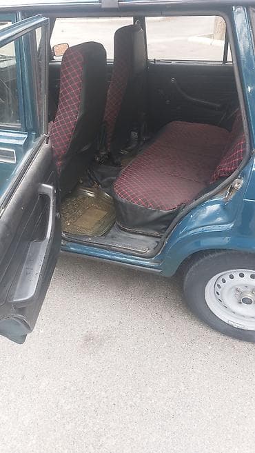kuzu: Lada 2104 universal - Kuzov: 5 qapılı universal, tünd mavi rəng - — 8