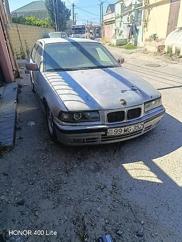 bmw bufer: BMW 3 series: 1.8 l | 1994 il Sedan — 4