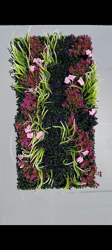 dekor daş: Müxtəlif süni bitkilərdən ibarət dekorativ divar paneli. Bu panellər — 3