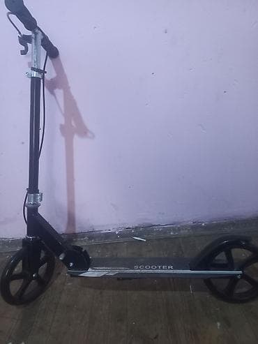 elektrikli drift scooter: Şəhərdaxili hərəkət üçün praktik mexaniki skuter. Xüsusiyyətlər: - — 1