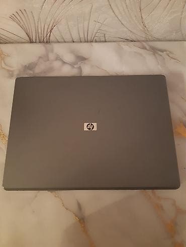 HP: HP noutbuk - Brend: HP - Korpusu tünd boz rəngdə, kompakt və klassik — 1