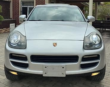 porsche disk: Porsche Cayenne (1-ci nəsil) – gümüşü rəngli SUV ili 2003 mator 4.5 — 2