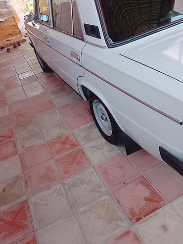 ucuz tap az t40: VAZ klassik seriyasından sedan (2101/21011 xətti) – ağ rəng. Mexaniki — 7