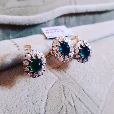 italyan qizili: Dəstə daxildir: Sırğa, Üzük, Çəhrayı qızıl, 583 Əyar, 1115 g — 2