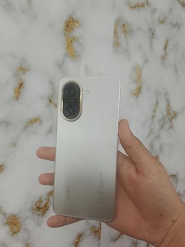 iphone xr qiymet: Redmi A5, 128 GB, rəng - Gümüşü, Sensor, Barmaq izi, İki sim kartlı — 8