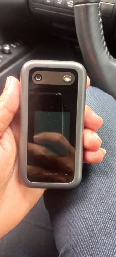 fly телефон раскладушка с большими кнопками: Nokia 1, rəng - Boz, İki sim kartlı — 3