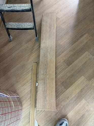 Laminat döşəmə sokulub seligeli tezden secilmir birlesme yerlerinde — 1