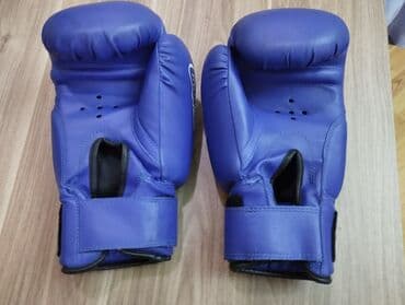 боксерская груша купить в баку: Mavi rəngdə "Everlast" markalı, 16 unsiya ölçüsündə boks əlcəkləri. Bu — 3