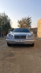 mercedes c dizel: Mercedes-Benz E 240: 2.4 l | 1998 il Sedan — 8