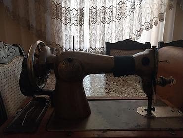 akustik gitara satisi: Mexanik tikiş maşını – çarxlı (ayaq pedalı ilə və ya əl çarxı ilə — 2