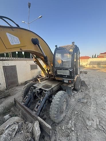 ekskavator icaresi: JCB təkərli ekskavator - Marka/model: JCB (təkərli ekskavator) - İş — 1