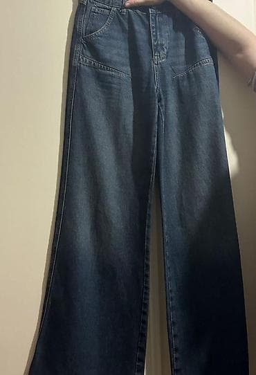 Geniş kəsimli cins şalvar M razmerdir az geyinilib ayaq hissesi