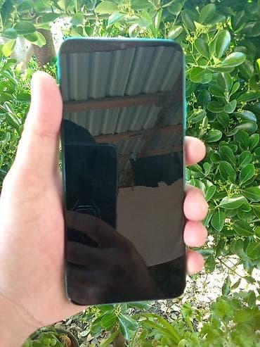 goy su: Redmi 9T, 64 GB, rəng - Göy, Barmaq izi, Face ID — 1