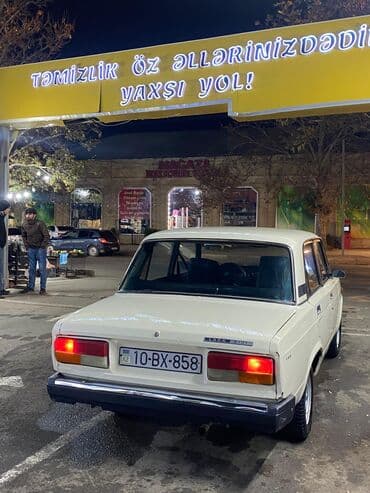 Avtomobil: Lada 2107 (sedan) Rəng: Açıq bej/ivory Dövlət nömrə nişanı
