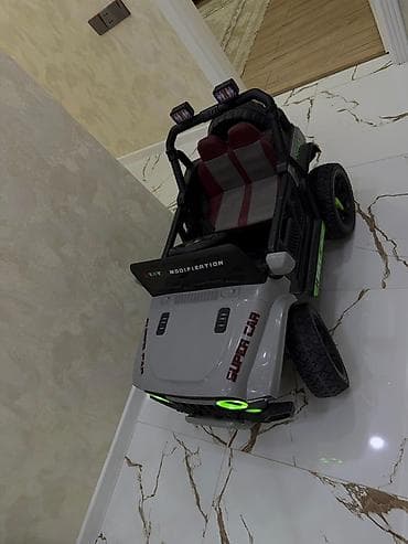 uwaq mawini: Uşaq üçün elektrikli off-road tipli maşın - Korpus: Jeep stilində — 2