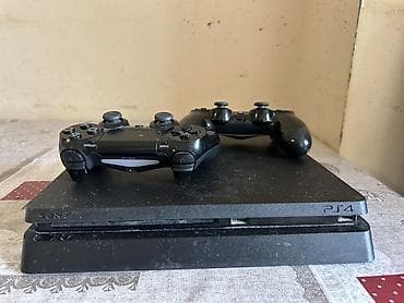 ssd satilir: Sony PlayStation 4 Slim oyun konsolu Komplekt: - PS4 Slim (qara rəng) — 1