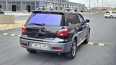 kompressor teh: Mitsubishi Outlander – şəhər və yolsuzluq üçün praktik krossover. - — 10