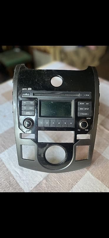 islenmis avtomobiller: Kia Cerato 2009-2012 audio maqnitola.Oriqinal üstən çıxma — 2