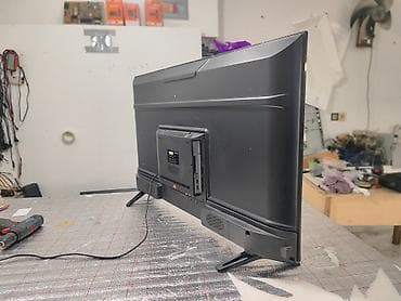 mini kondisener: TOKLA Smart TV – geniş funksiyalı televizor - Ekran: Təxminən 40–43 — 1