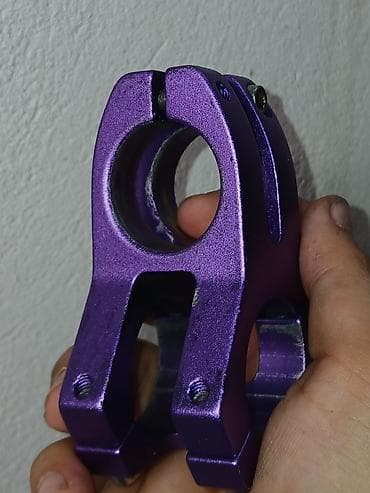 Велоаксессуары: Velosiped üçün sükan boğazı (stem), bənövşəyi rəngdə. Alüminium — 4